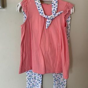 Girls outfit includes shirt, pants and headband